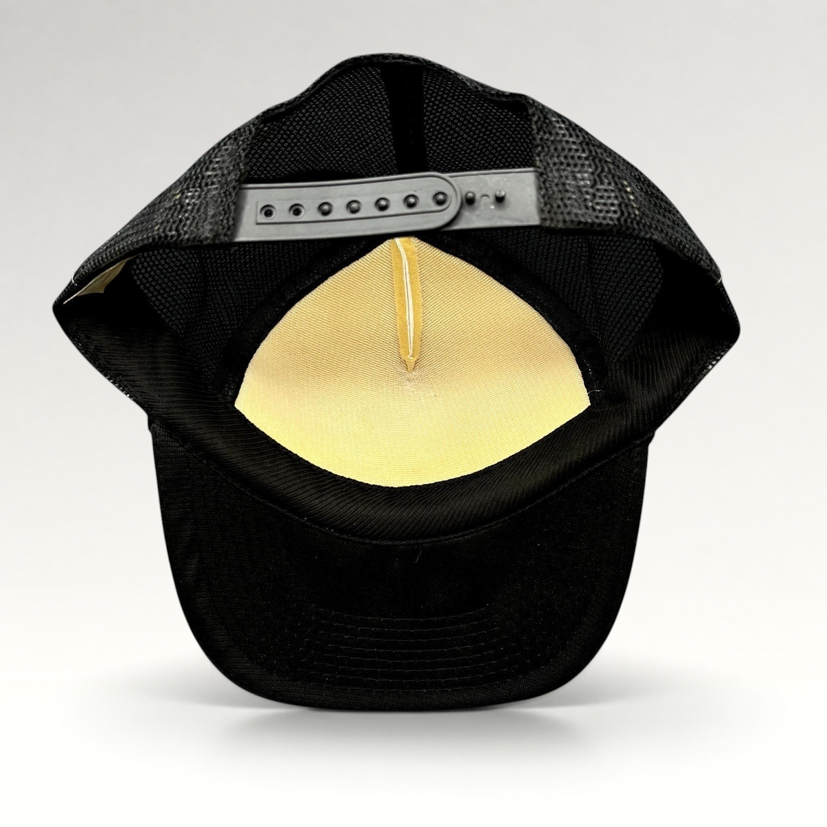 Raree Finds vintage Rockstar Energy Drink trucker hat interior view showing black mesh and adjustable snapback strap