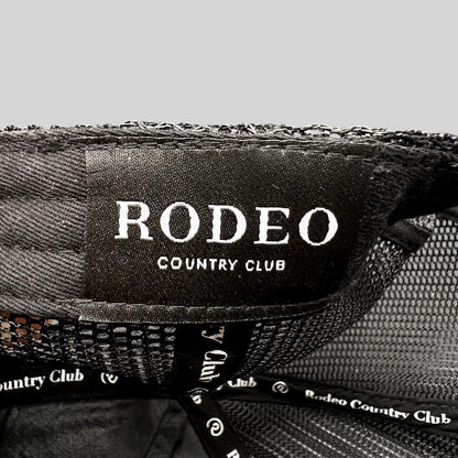 Raree Finds black Rodeo Country Club trucker hat interior label and branded taping detail