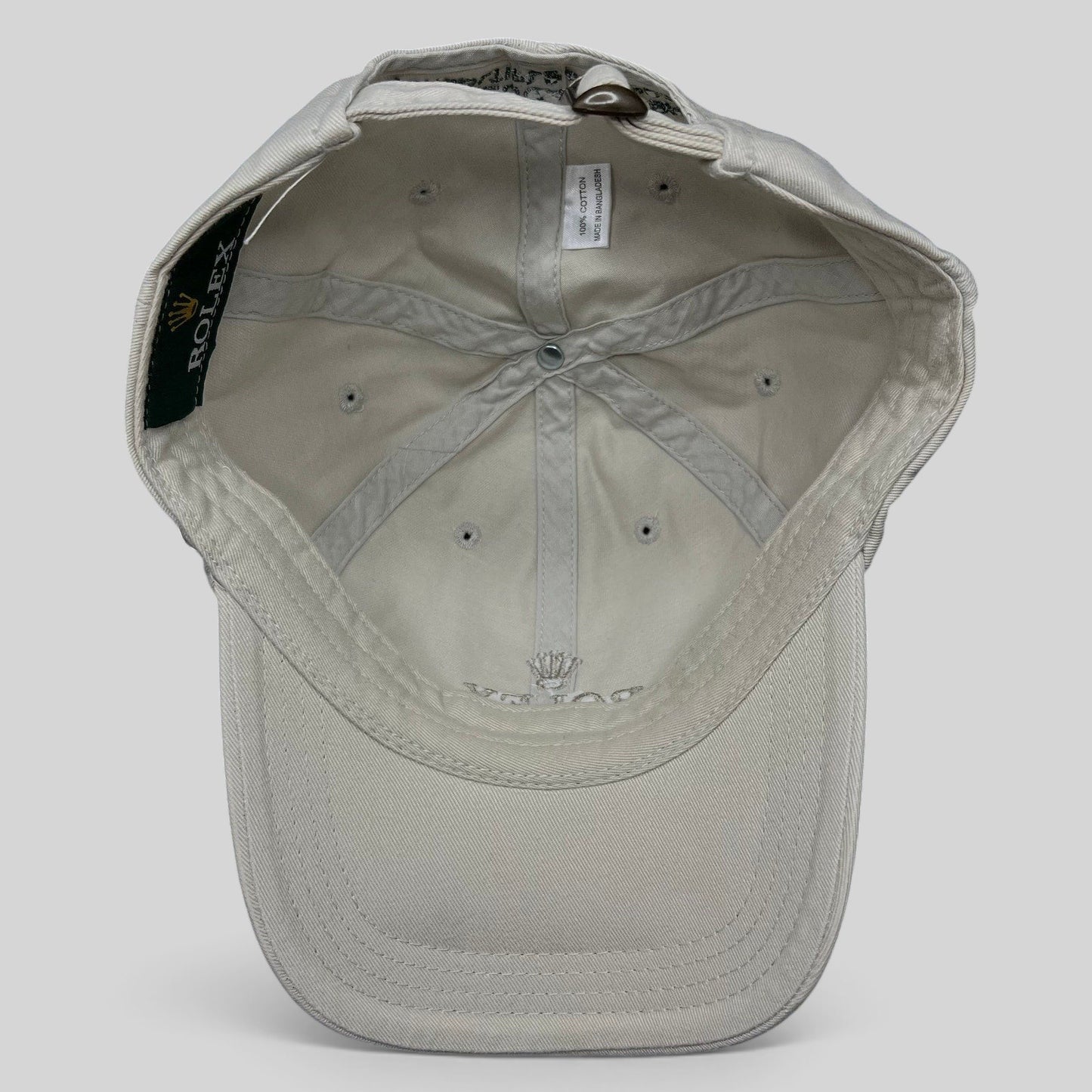 Raree Finds vintage Rolex khaki cotton strapback golf hat with interior crown logo embroidery and metal buckle