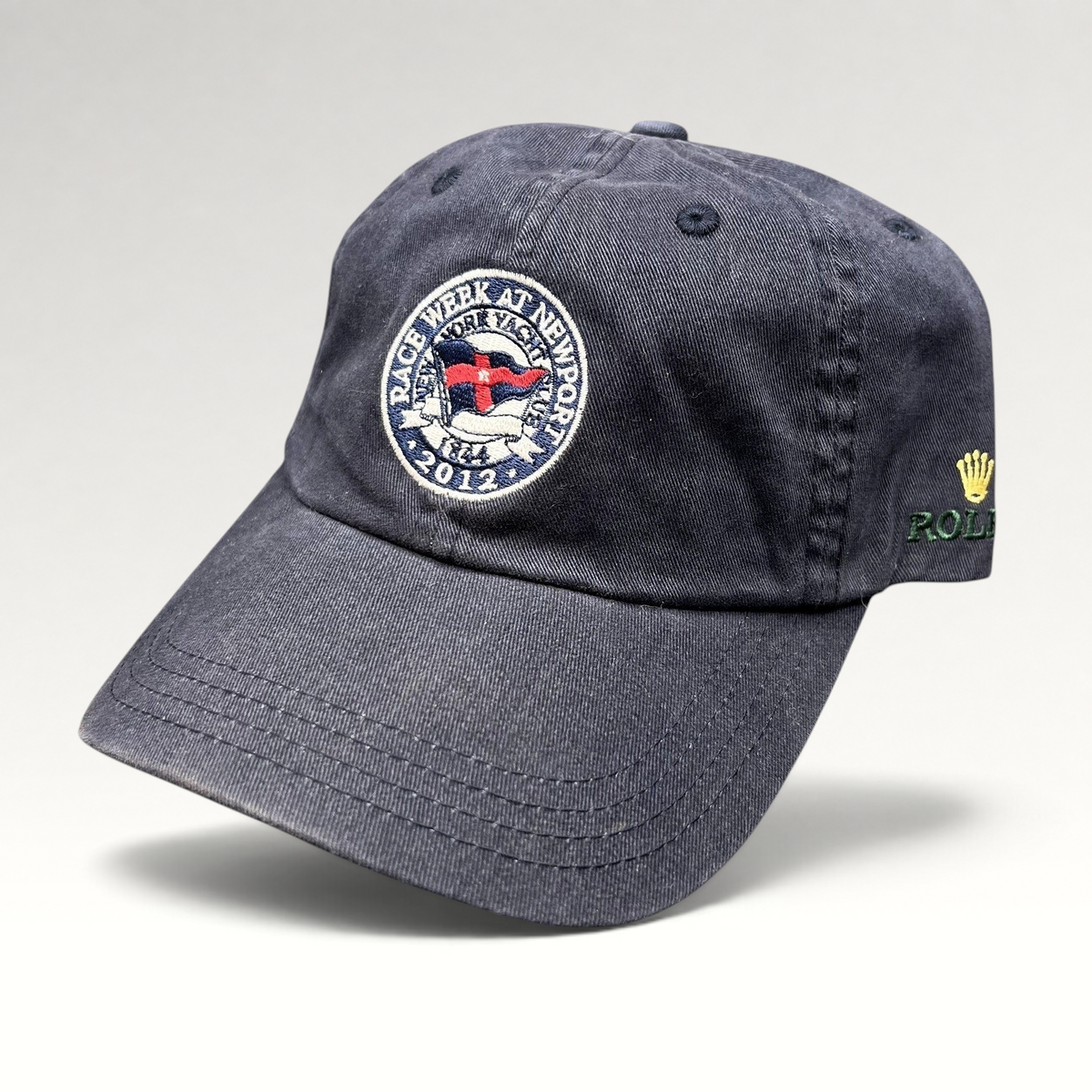 Raree Finds navy blue 2012 Rolex Newport Bermuda Race Week sailing cap with embroidered event crest and side logo