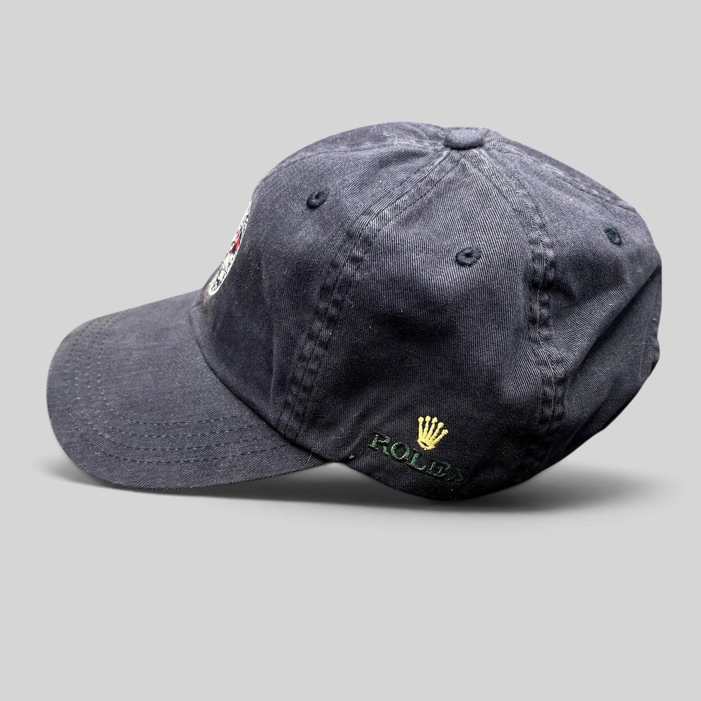 Raree Finds navy blue 2012 Rolex Newport Bermuda Race Week sailing cap with embroidered logo and green undervisor