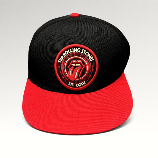 Raree Finds The Rolling Stones Zip Code 2015 tour snapback hat with black crown, red brim, and embroidered logo patch.