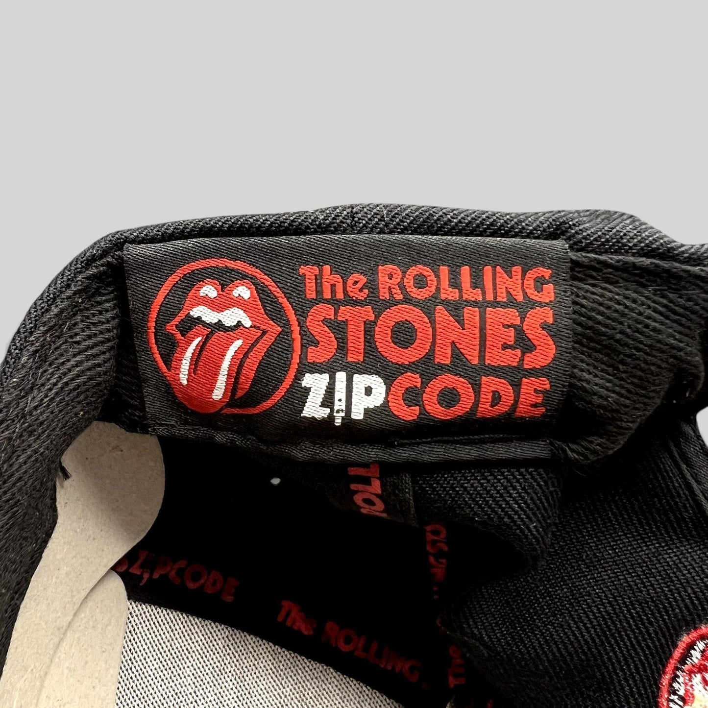 Raree Finds The Rolling Stones Zip Code 2015 tour hat interior label with iconic tongue and lips logo