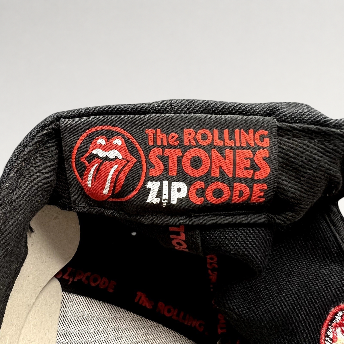 Raree Finds The Rolling Stones Zip Code 2015 tour hat interior label with iconic tongue and lips logo