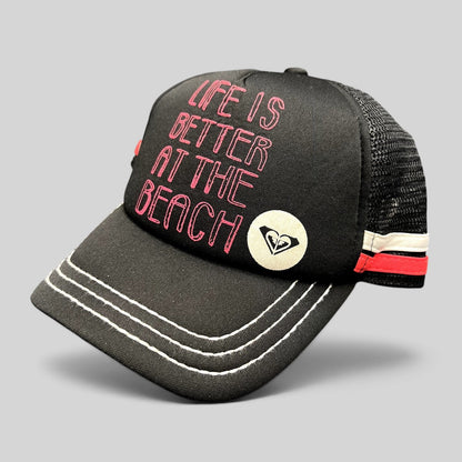 Raree Finds Roxy black trucker hat with pink Life Is Better At The Beach embroidery and mesh back