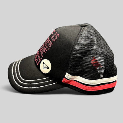 Raree Finds Roxy black trucker hat with pink embroidered text and heart logo, featuring mesh back and contrast brim.