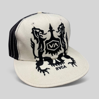 Raree Finds vintage RVCA snapback hat in black and white with a bold crest graphic and flat bill design.