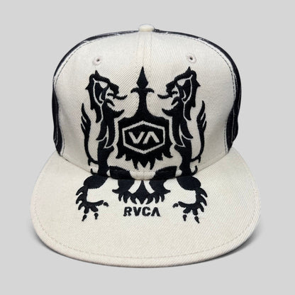 Raree Finds vintage RVCA black and white wool blend snapback hat featuring a symmetrical crest graphic on the crown.