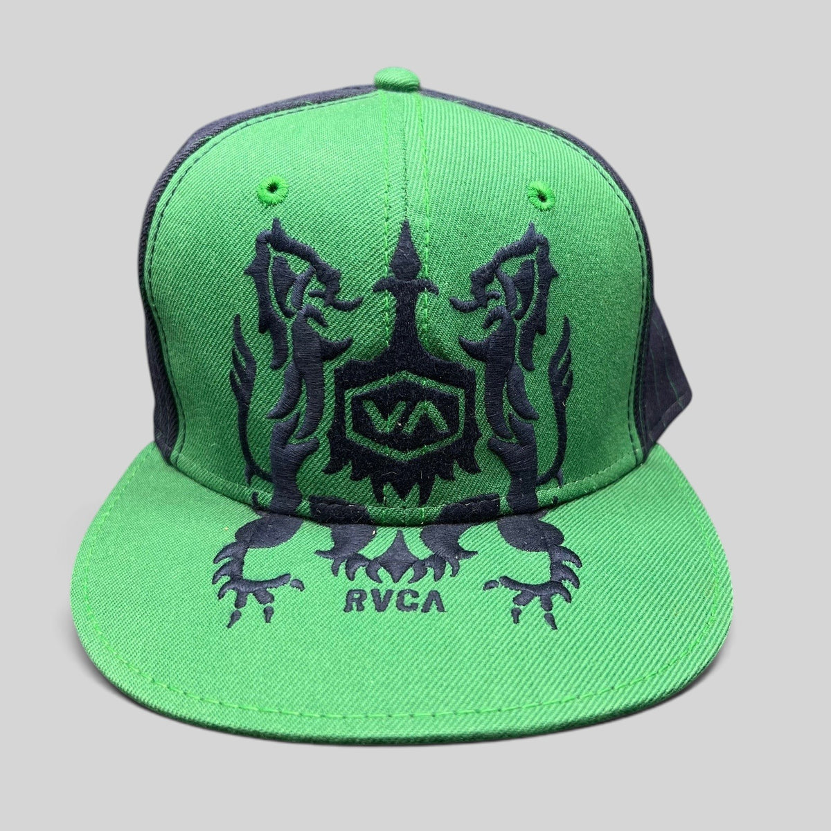 Raree Finds vintage RVCA snapback hat in bright green with black embroidered lion crest logo and flat brim