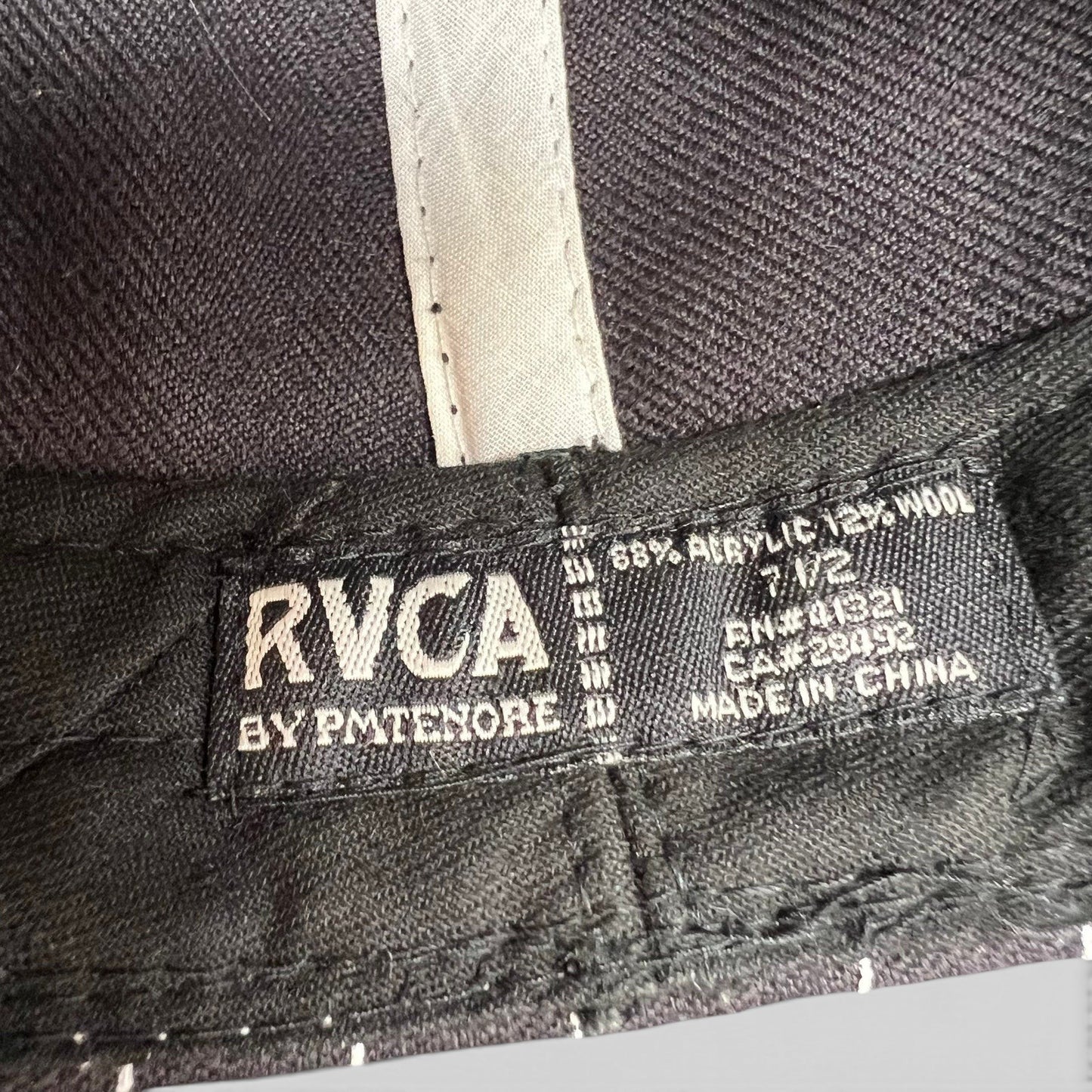 Raree Finds RVCA by PM Tenore hat interior label showing size 7 1/2 and wool blend material composition