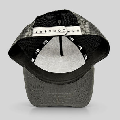 Raree Finds 2023 Ryder Cup New Era snapback trucker hat showing the interior construction and adjustable strap