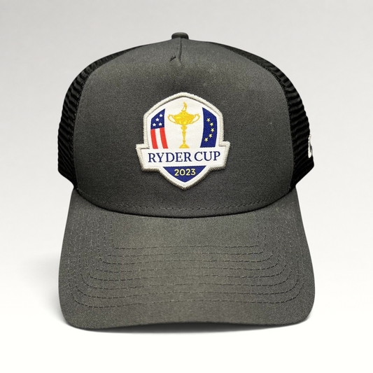 Raree Finds 2023 Ryder Cup New Era snapback trucker hat in charcoal gray and black with embroidered tournament logo