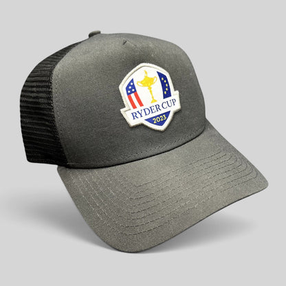 Raree Finds 2023 Ryder Cup snapback trucker hat in charcoal gray with black mesh back and embroidered tournament logo