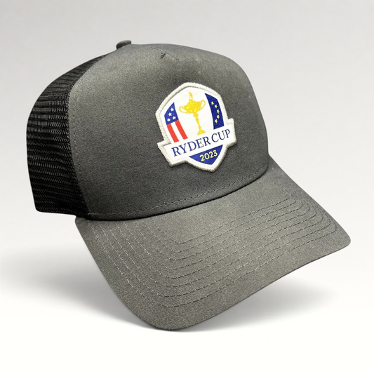 Raree Finds 2023 Ryder Cup snapback trucker hat in charcoal gray with black mesh back and embroidered tournament logo