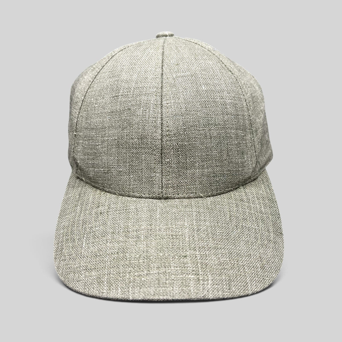 Raree Finds Angelico Italian linen strapback cap in sage green with an unstructured minimalist design.