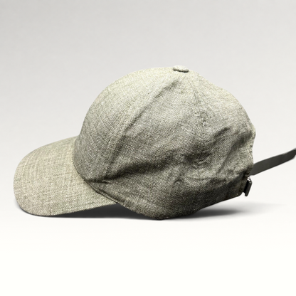 Raree Finds sage green Angelico linen strapback cap with an unstructured profile and adjustable metal hardware closure.