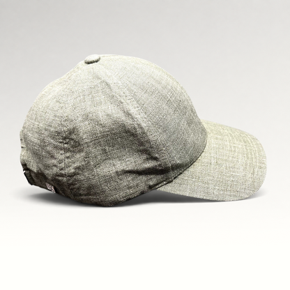 Raree Finds sage green Angelico Italian linen strapback cap with an unstructured profile and minimalist design.
