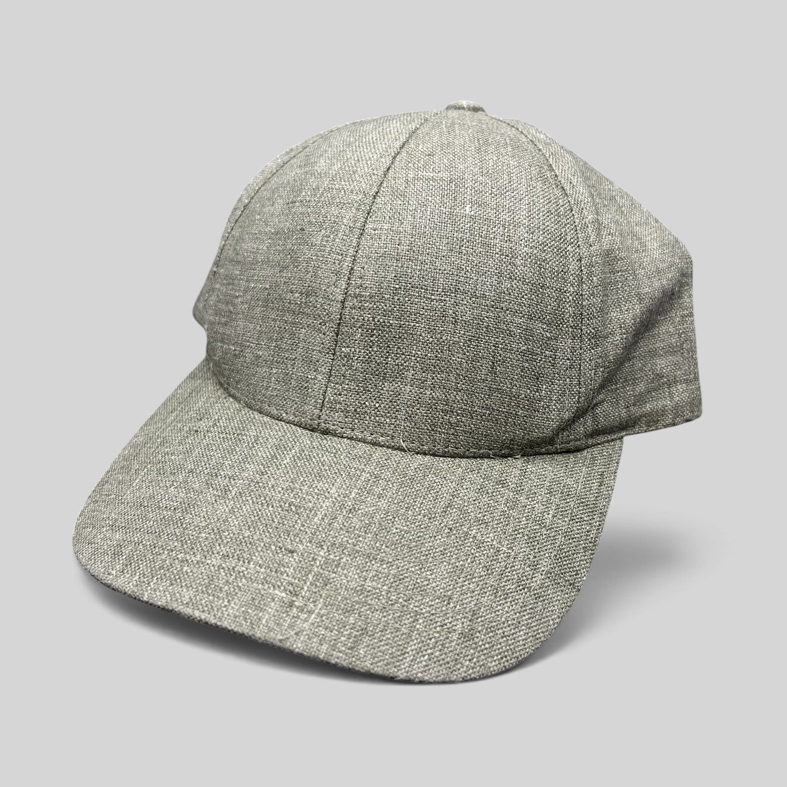 Raree Finds sage green Angelico Italian linen strapback cap with an unstructured profile and minimalist design.