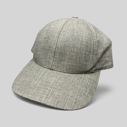 Raree Finds sage green Angelico Italian linen strapback cap with an unstructured profile and minimalist design.