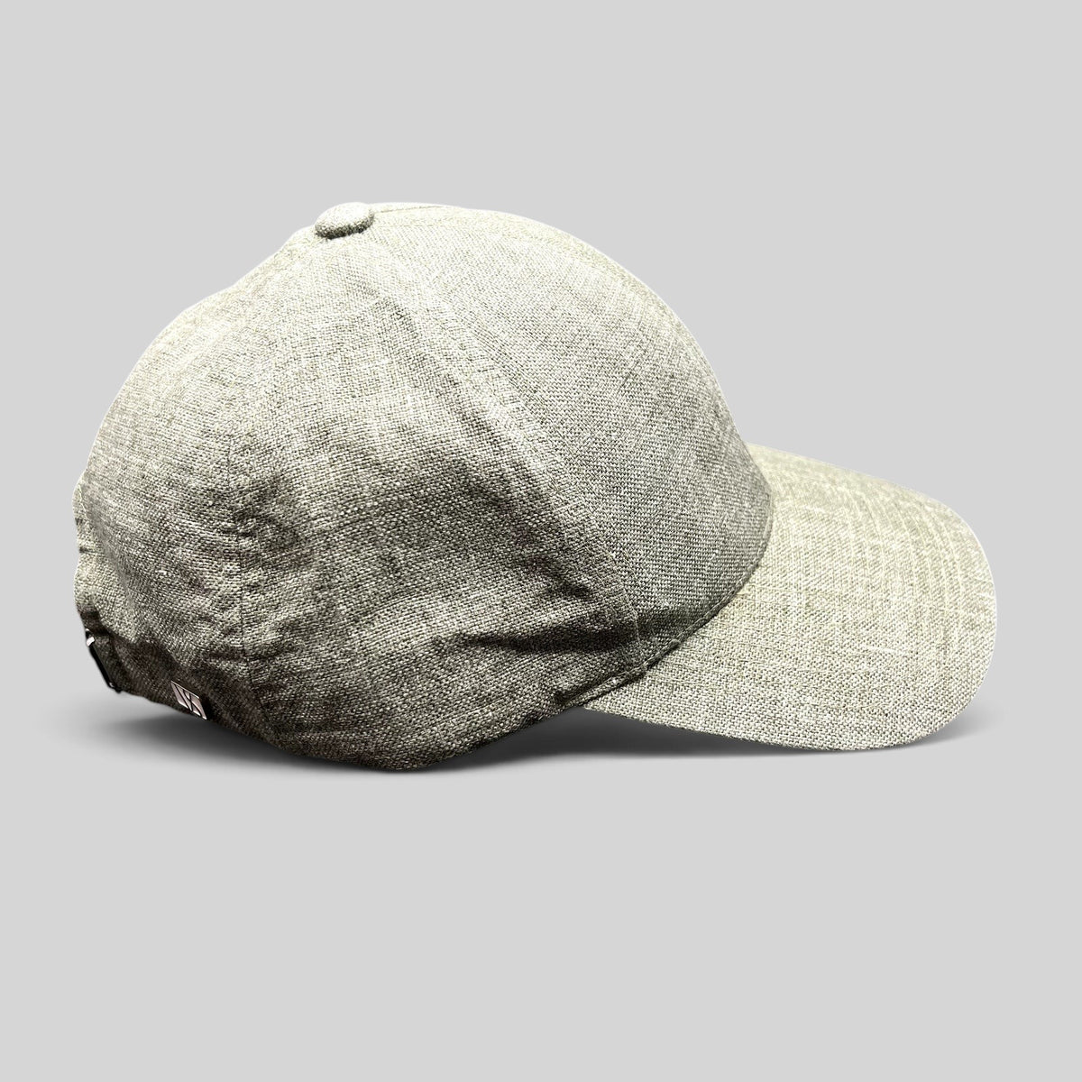 Raree Finds sage green Angelico Italian linen strapback cap with an unstructured profile and metal hardware