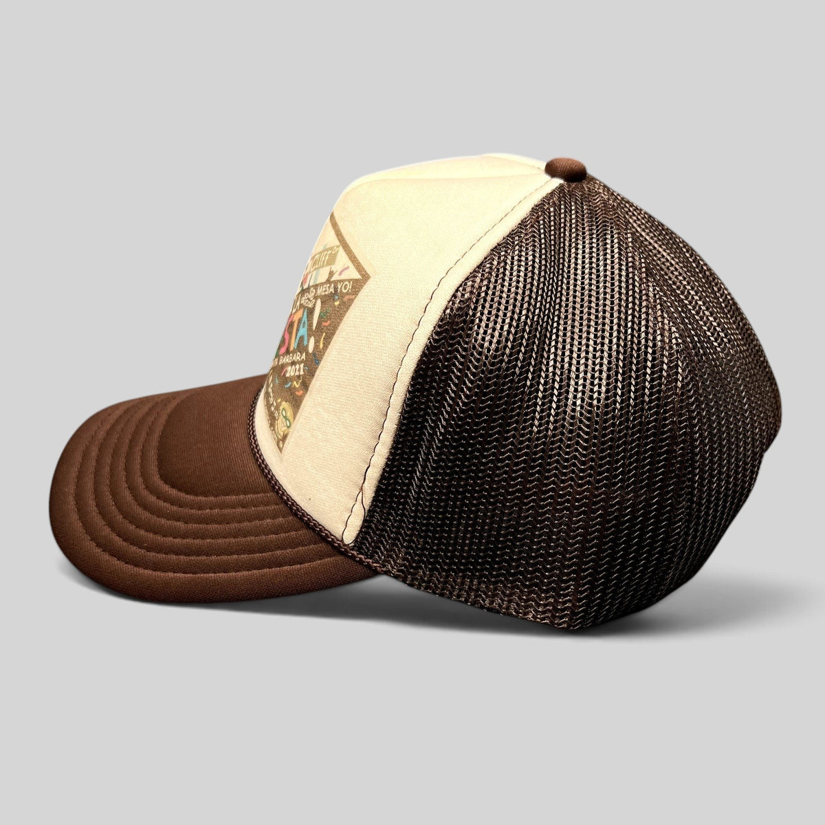 Raree Finds brown and cream mesh trucker snapback hat with Santa Barbara Fiesta 2021 graphic side profile view