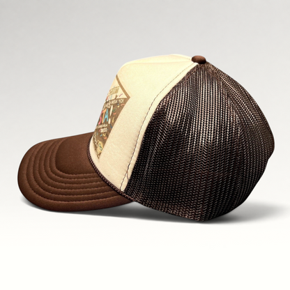 Raree Finds brown and cream mesh trucker snapback hat with Santa Barbara Fiesta 2021 graphic side profile view