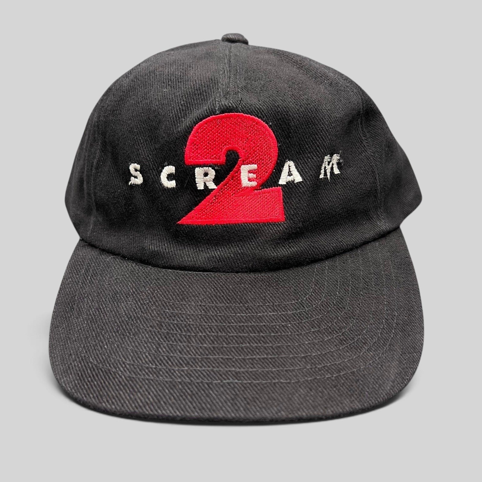 Raree Finds vintage 1997 Scream 2 black cotton snapback hat with red and white embroidered movie logo