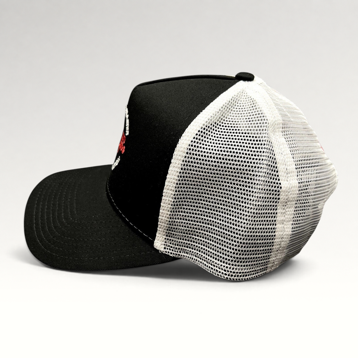 Raree Finds New Era 9FORTY SDF trucker snapback hat in black and white with mesh back panels and curved visor