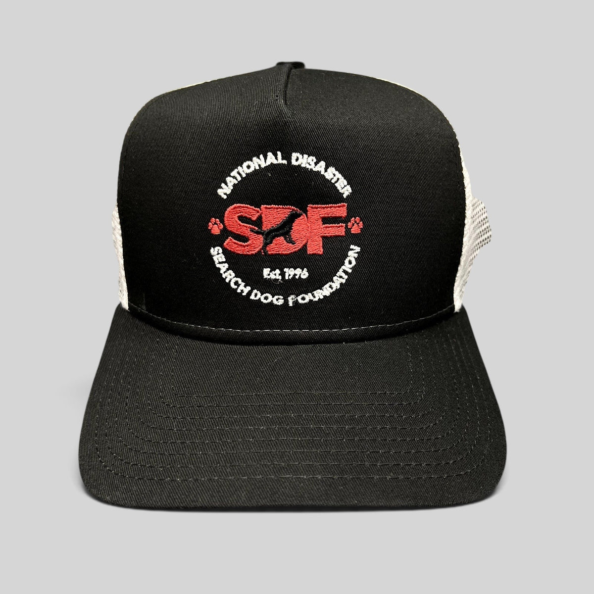 Raree Finds New Era 9FORTY trucker hat with black front, white mesh back, and embroidered SDF logo on the crown.