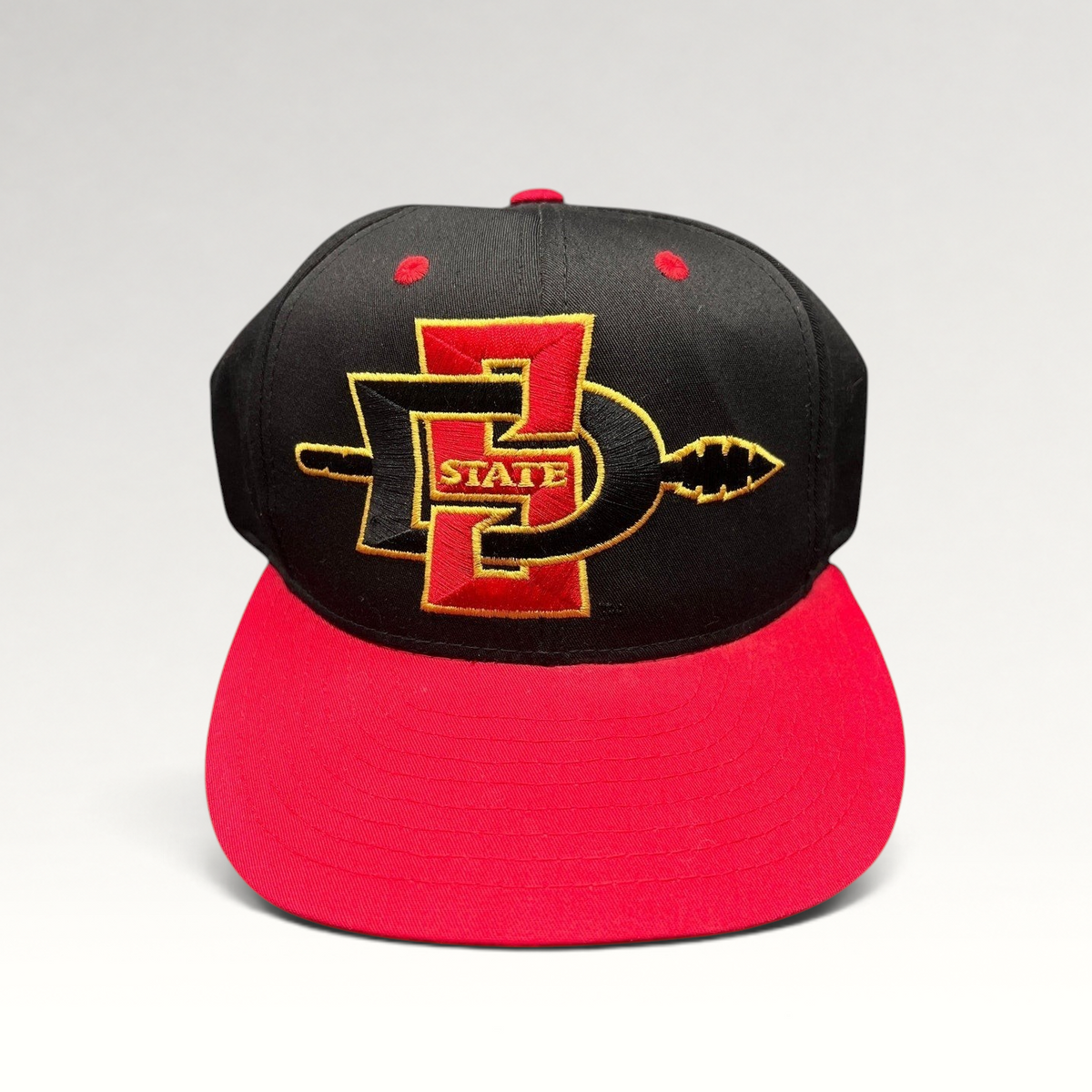 Raree Finds vintage San Diego State Aztecs snapback hat in black and red cotton with gold embroidered spear logo
