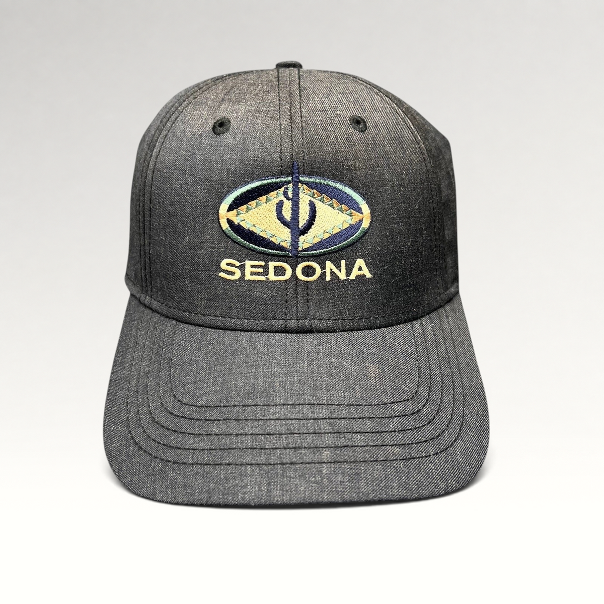 Raree Finds vintage sun-faded black cotton strapback hat with colorful embroidered Sedona Arizona logo