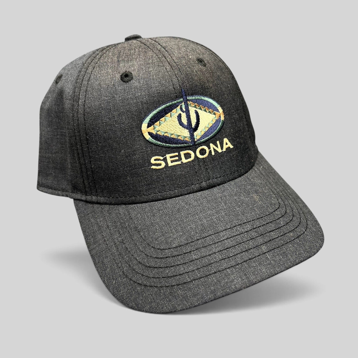 Raree Finds vintage sun-faded black cotton strapback hat with colorful Sedona Arizona Southwestern logo embroidery