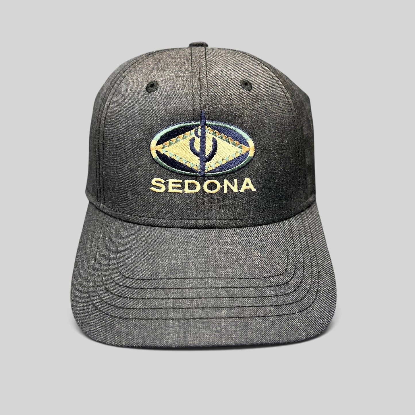Raree Finds vintage sun-faded black cotton strapback hat with colorful Sedona Arizona Southwestern logo embroidery