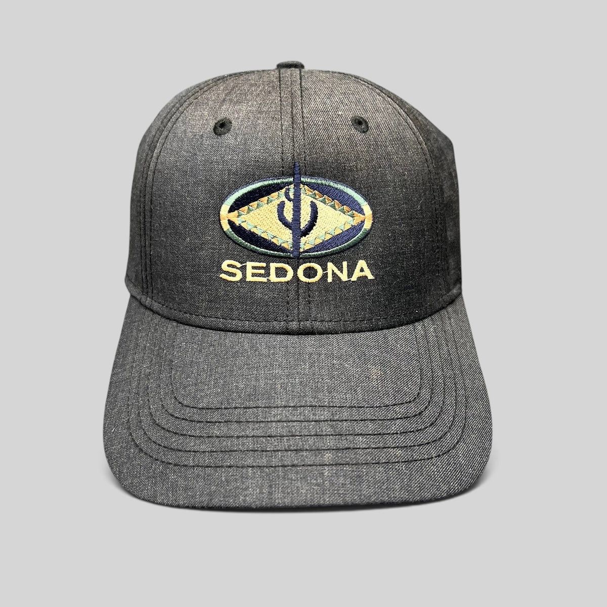 Raree Finds vintage sun-faded black cotton strapback hat with colorful Sedona Arizona Southwestern logo embroidery