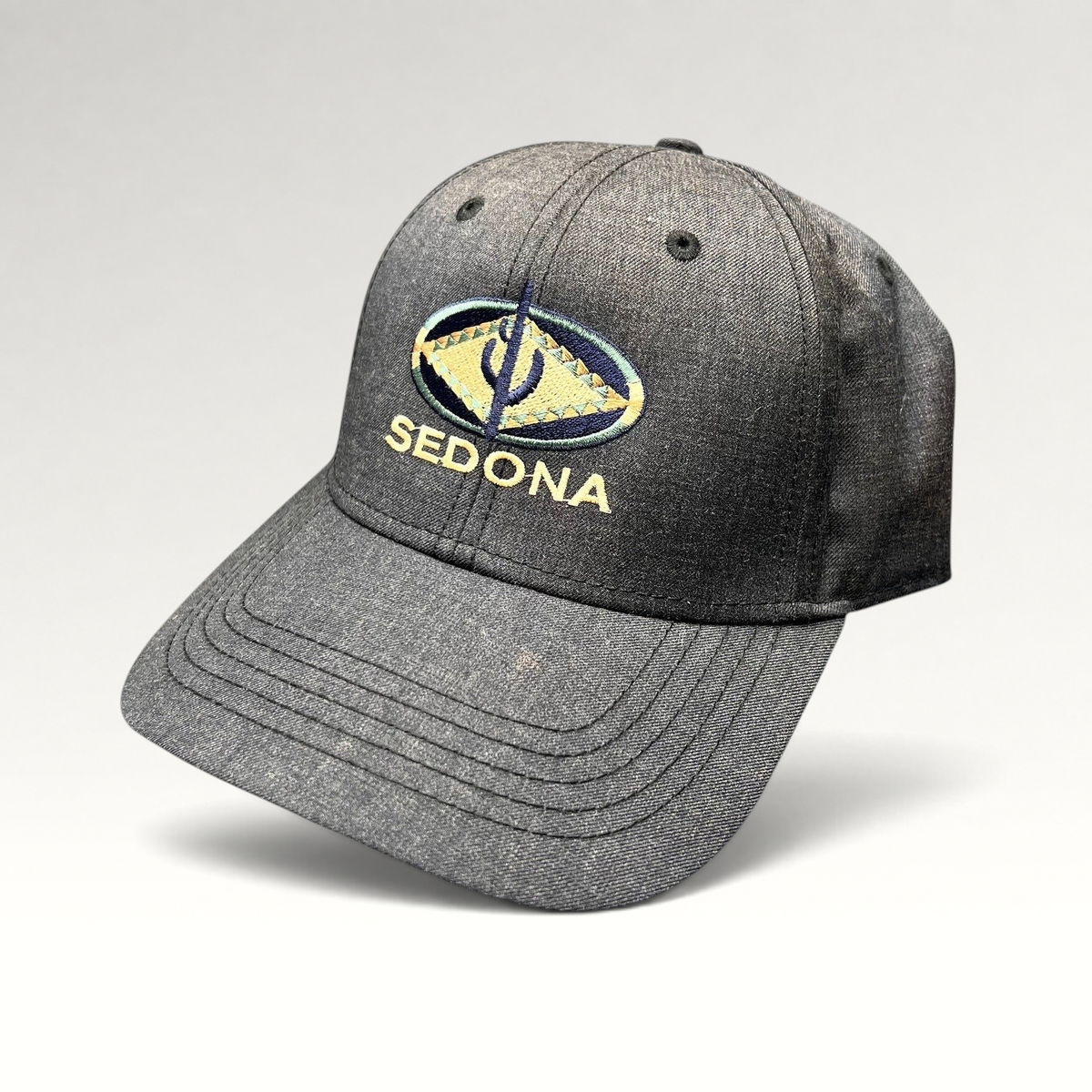 Raree Finds vintage sun-faded black cotton strapback hat with colorful embroidered Sedona Arizona desert logo