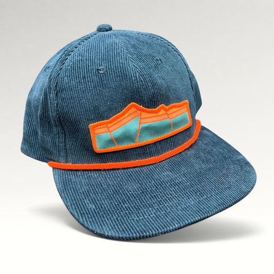 Raree Finds Sendero Provisions Co blue corduroy snapback hat with orange rope trim and mountain graphic patch