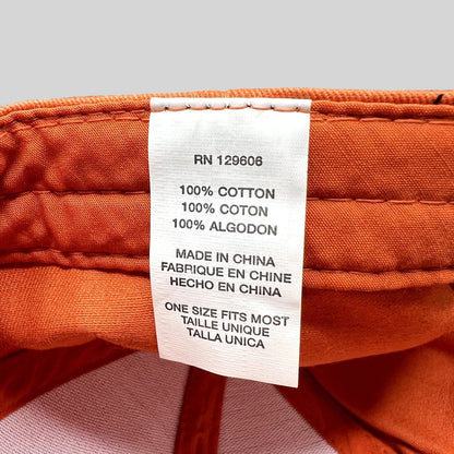 Raree Finds Shock Top hat interior care label showing 100 percent cotton material and one size fits most sizing