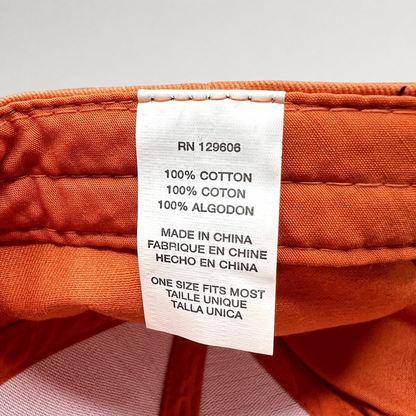 Raree Finds Shock Top hat interior care label showing 100 percent cotton material and one size fits most sizing