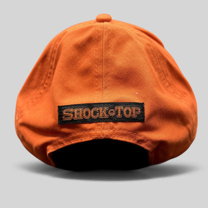 Raree Finds Shock Top orange cotton strapback hat with black rear logo embroidery and adjustable hook-and-loop strap