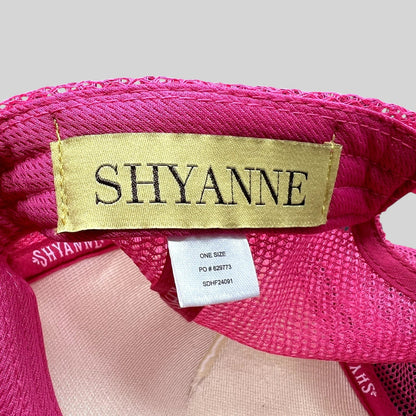 Raree Finds Shyanne pink trucker hat interior label showing brand logo and size tag on mesh fabric