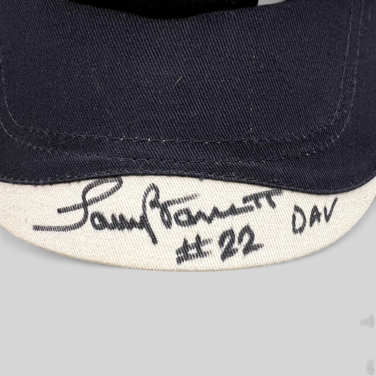 Raree Finds Cap America navy and cream strapback hat with a signed brim reading #22 DAV