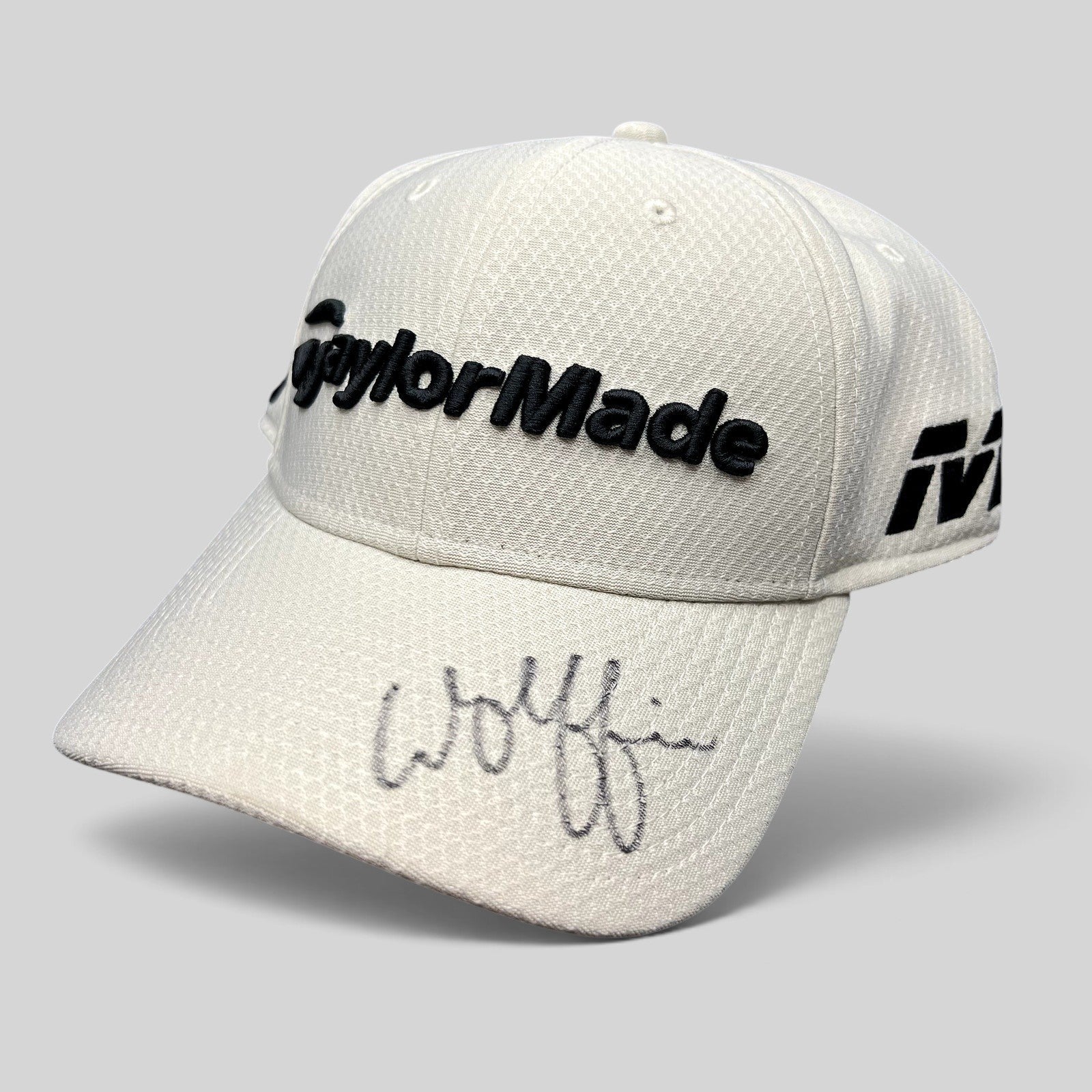 Raree Finds white TaylorMade New Era 39THIRTY golf hat signed by Matt Wolff on the brim with black embroidery