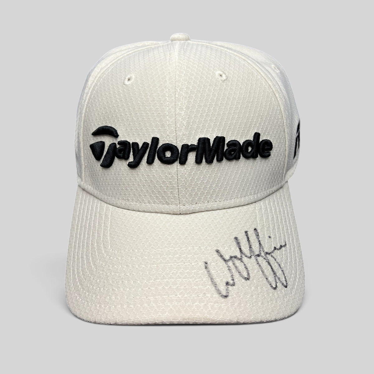 Raree Finds white TaylorMade New Era 39THIRTY golf hat with Matt Wolff autograph signed in black marker on the brim