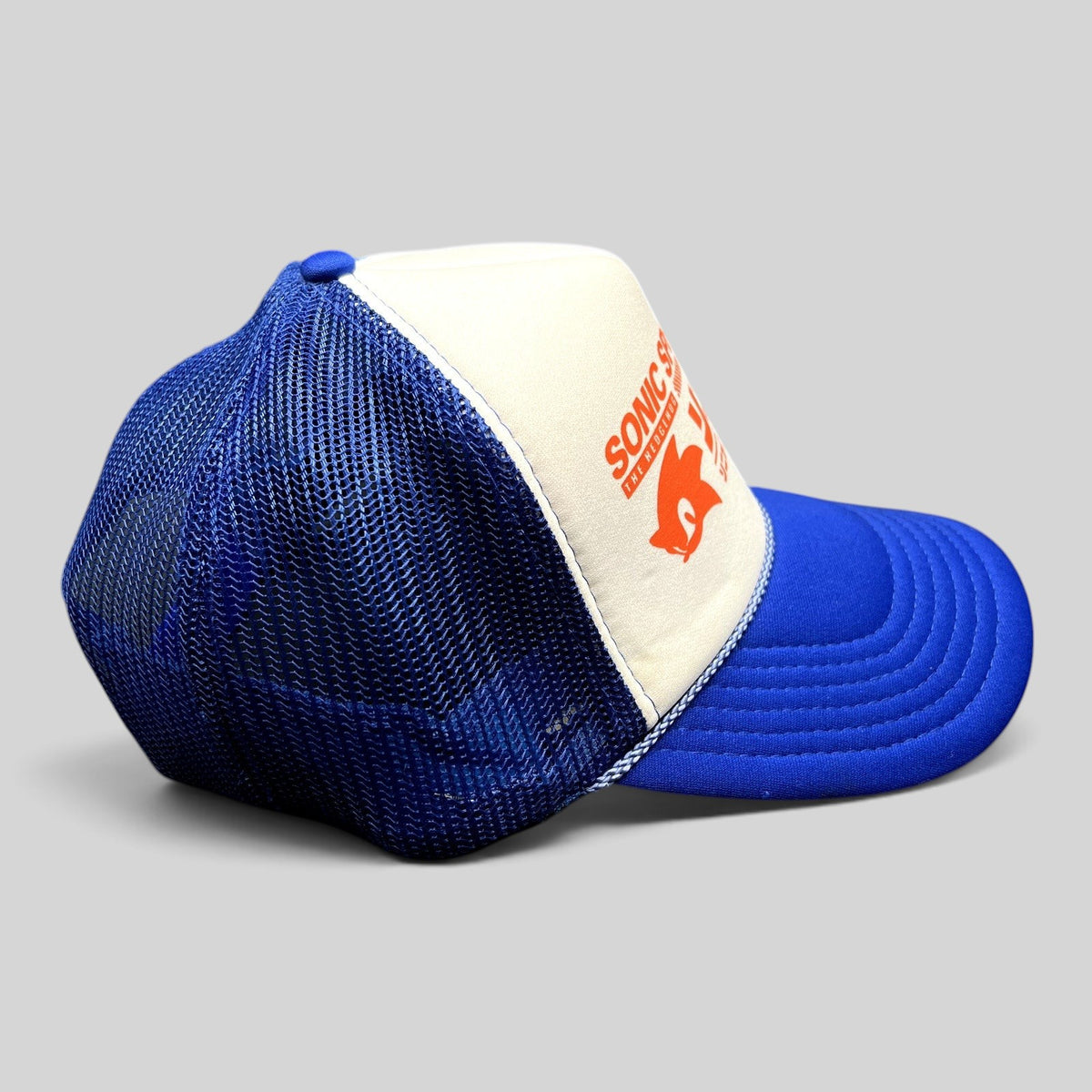 Raree Finds Sonic Speed Café trucker hat in blue and white with Japanese katakana and mesh back panels