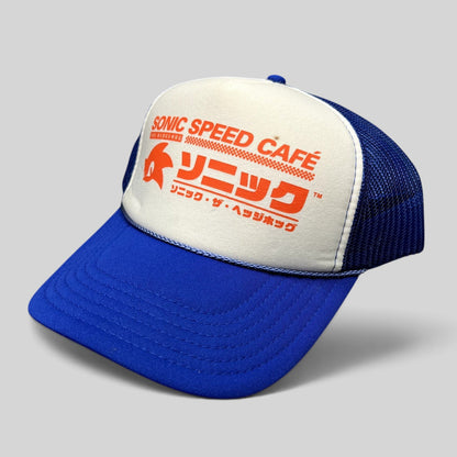 Raree Finds Sonic Speed Café trucker hat with blue mesh back, white foam front, and Japanese Sonic the Hedgehog logo.