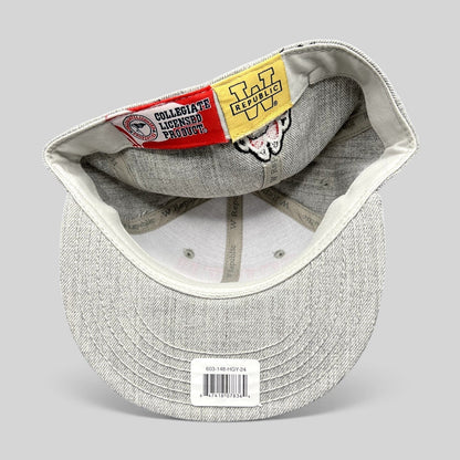 Raree Finds South Dakota fitted hat interior showing W Republic branding and official collegiate licensed product tags