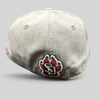 Raree Finds South Dakota collegiate fitted hat in heather gray with a red and white embroidered paw logo on the back