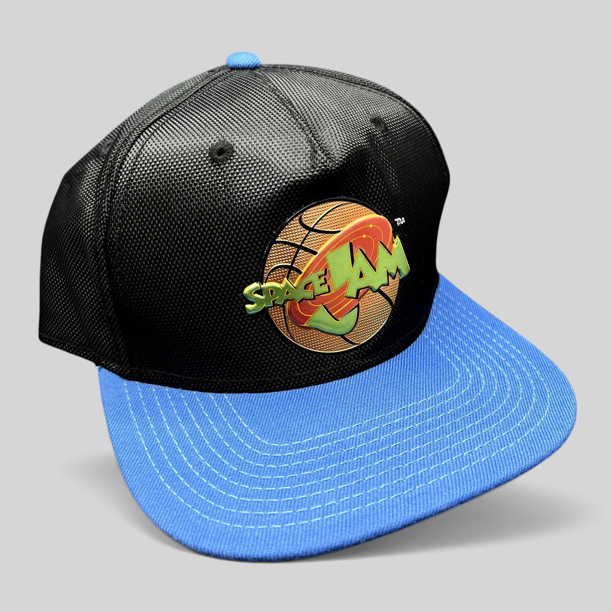 Raree Finds 2016 Space Jam snapback hat with a textured black crown, bright blue flat brim, and embroidered logo.