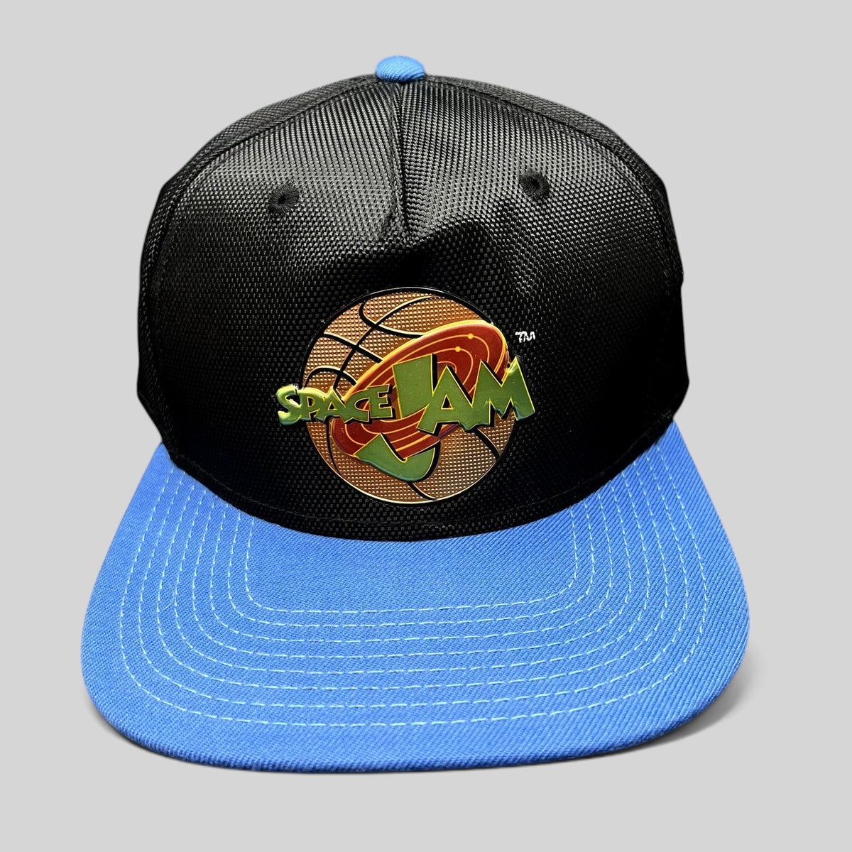 Raree Finds 2016 Space Jam snapback hat with a textured black crown, bright blue flat brim, and embroidered logo.