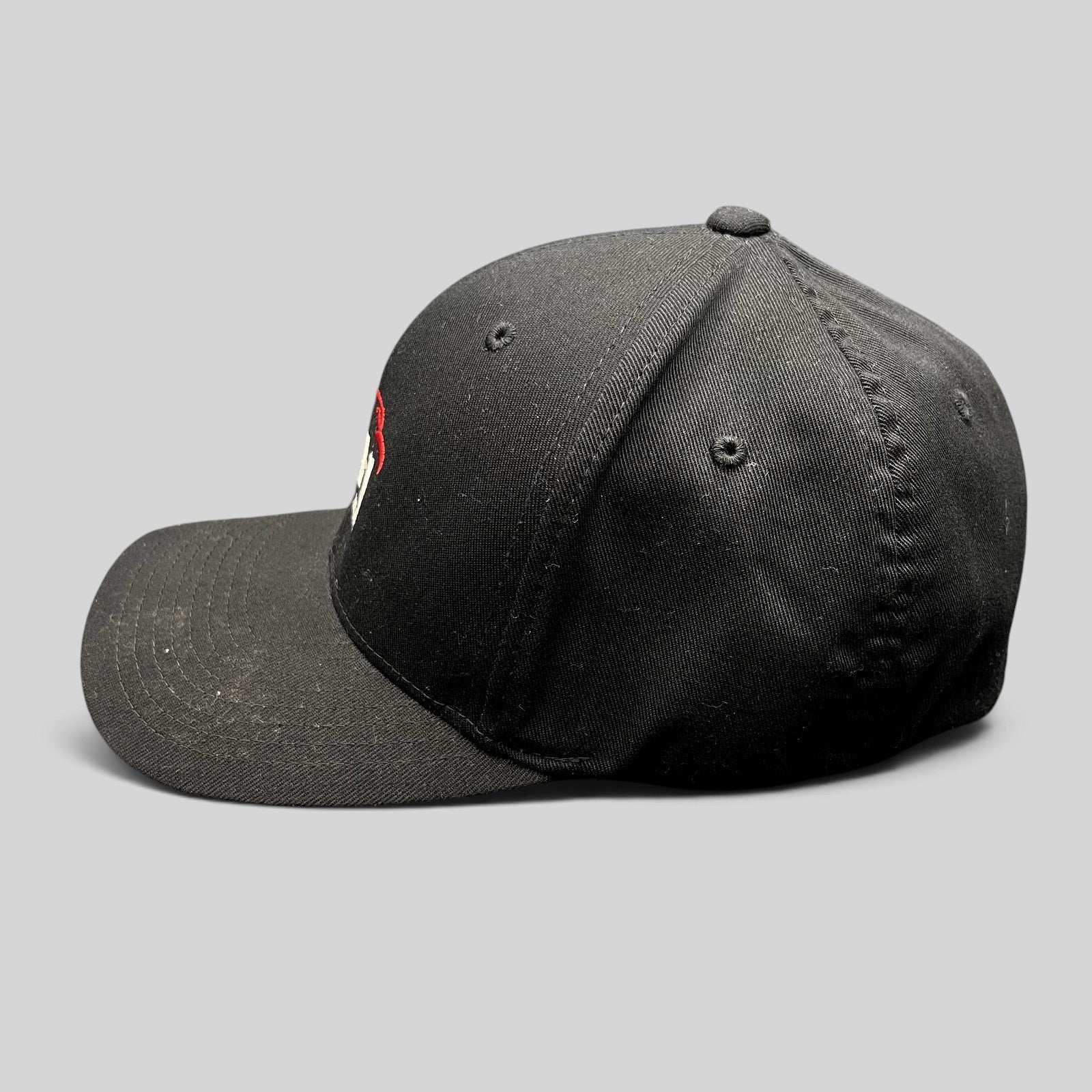 Raree Finds black SpaceX Falcon Heavy Flexfit hat with red and white embroidered logo and curved brim